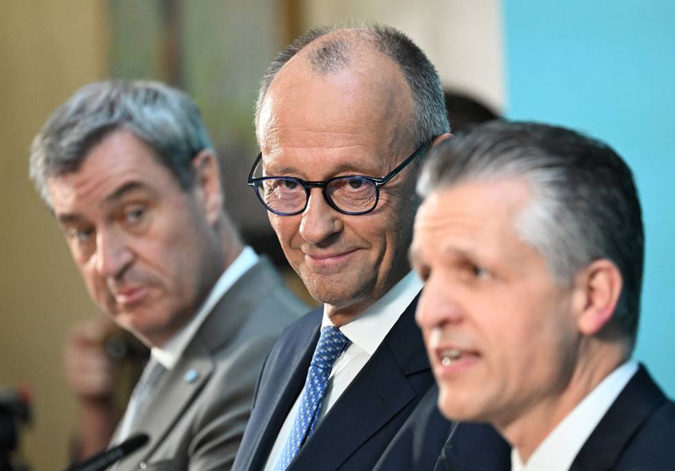 soeder_merz_frei_foto_RALF_HIRSCHBERGER_AFP.jpg